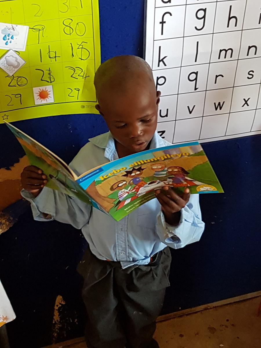 The Bilingual Interactive Differentiated Classrooms programme made books the focus of learning and improved six-year old Thobela Bhoyoyo’s reading ability.