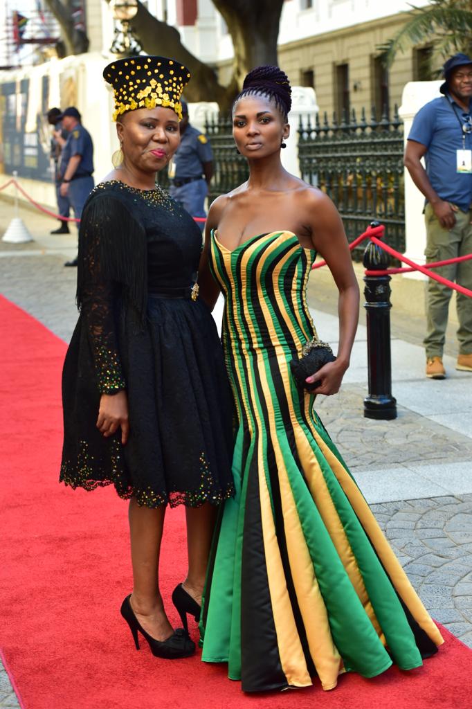 Minister of Small Business Development (left) Lindiwe Zulu in a black dress.