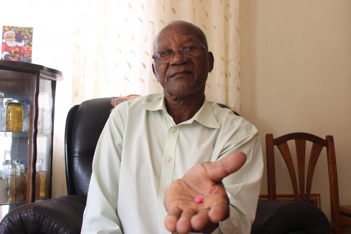 Beneficiary of the CCMDD programme, Alpheus Goba, displays the medication he fetches at his local church instead of joining long queues at Prince Mshiyeni Hospital.