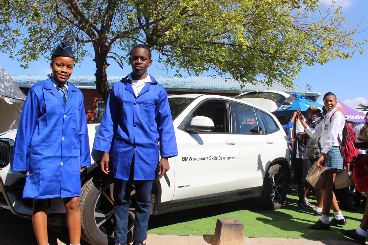 Busisiwe Nhlapo and Samito Hlonipha are excited about a donation of a BMW X3 model to their school