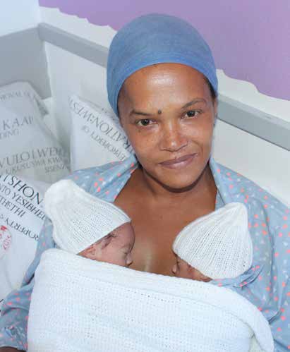 Trevlynn Moses with her twin baby boys who were born six weeks early.