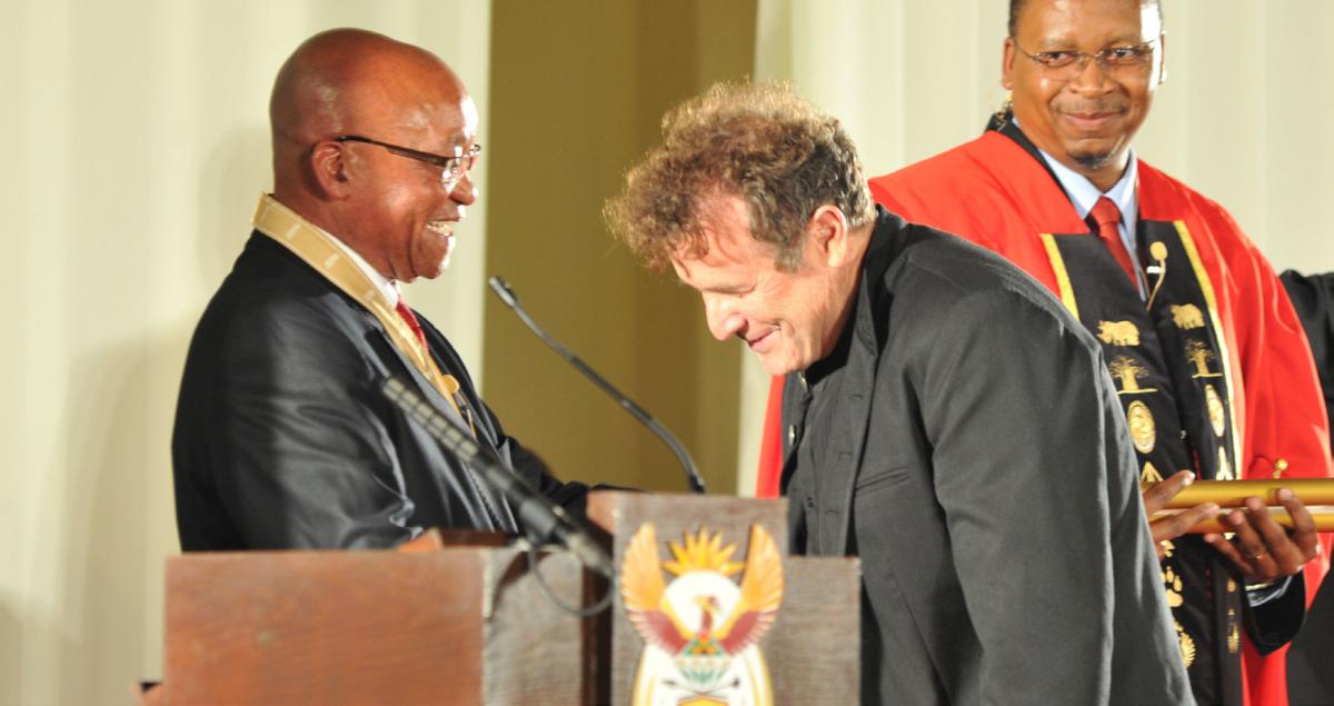 Johnny Clegg received the National Order of Ikhamanga – awarded in Silver.