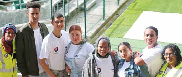 Parents and volunteers taking part in the Walking Bus initiative which ensures that school children travel safely to school and back.