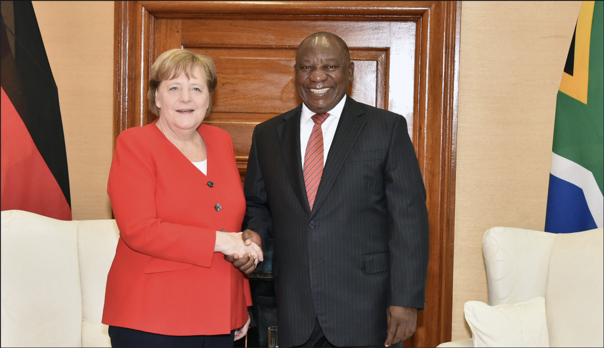President Cyril Ramaphosa with German Chancellor Angela Merkel during the handover of vehicles, sponsored by BMW, to help fight GBVF. 