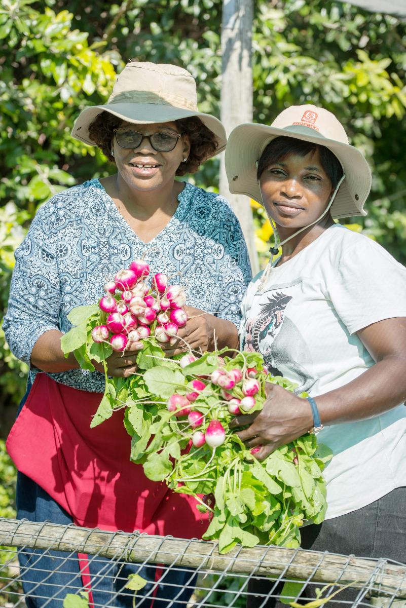 Nokwanda Nkqwayi (left) and Andiswa Bukula who are part of the Siyazama Community Food Garden.