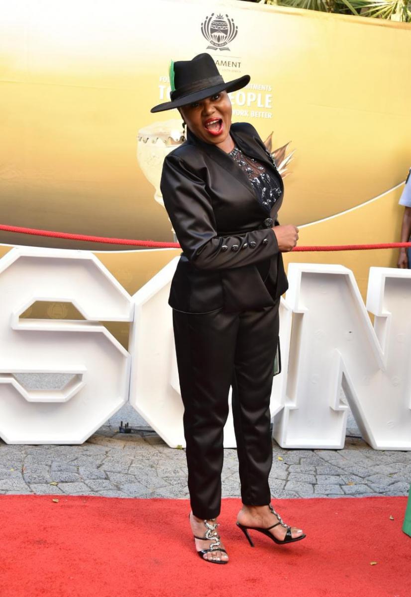 Social Development Minister Lindiwe Zulu kept it simple but elegant, in a metallic black suit.