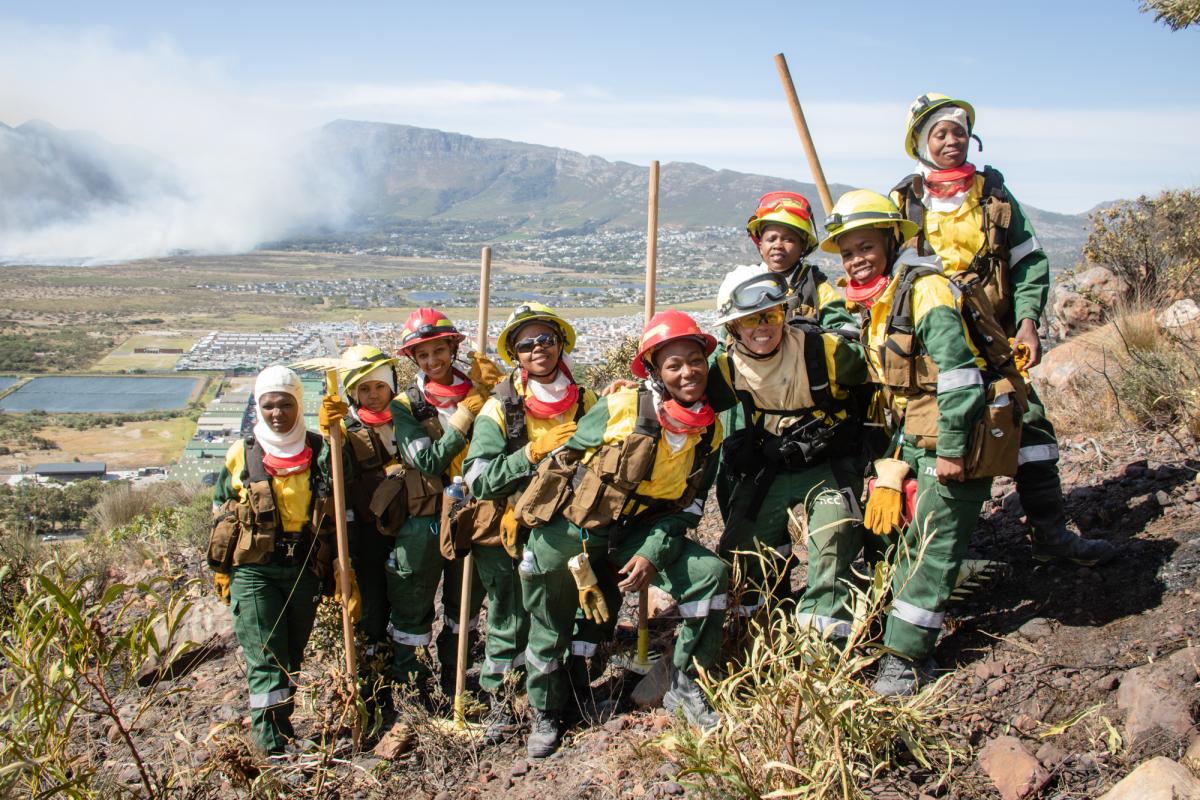 With the world celebrating International Women's Day on the 8th of March, the Juliet Crew is Image: by Jurie Senekal shattering gender stereotypes by proving that women can tame raging fires. [Photo: Charl Steenkamp/NCC Environmental Services.]