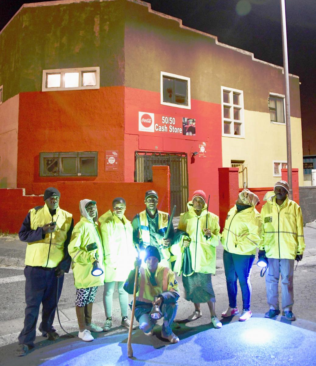 Members of the Vukusebenza Neighbourhood Watch patrol the streets of Mandela Park in Khayelitsha, Cape Town.