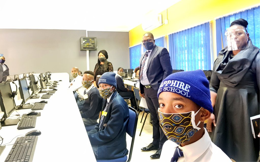 MEC Panyaza Lusufi with pupils from Rutasetjhaba Secondary School after government partnered with the SA MTN Foundation to ensure that schools impacted by the global pandemic have the technological tools they need. MEC Panyaza Lusufi with pupils from Rutasetjhaba Secondary School after government partnered with the SA MTN Foundation to ensure that schools impacted by the global pandemic have the technological tools they need.