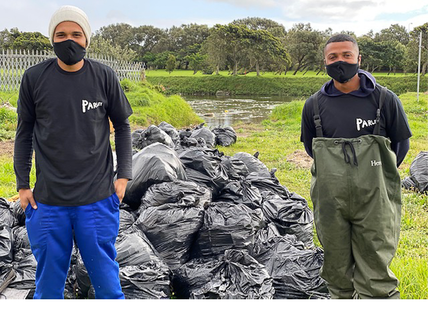 Litterbooms help to collect waste in rivers, while creating jobs. Photo: The Litterboom Project