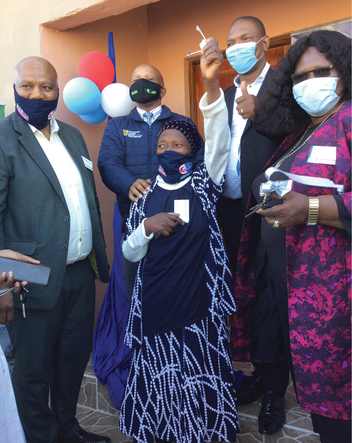 Jubilation! As Nomciciyelo Makabane holds the keys to her new home.