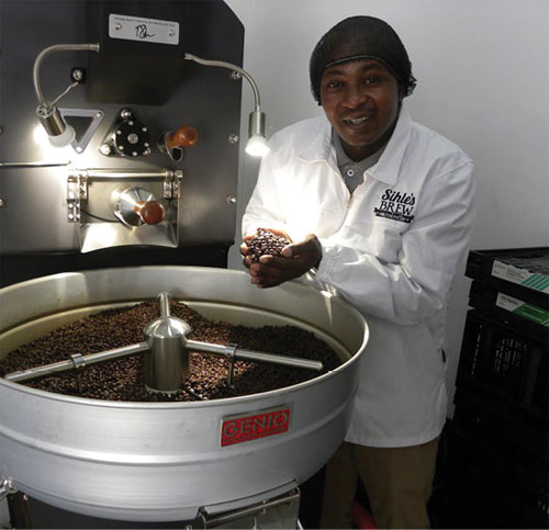 Sihle Magubane ready to make a fresh brew of coffee.