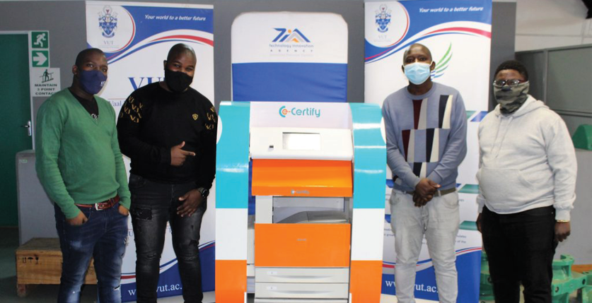  Head of the Design Department at the VUTSGSTP Michael Serapelo, owners of E-Certify Thabang Mamantsebe and Pule Maake, and VUTSGSTP designer Teboho Kekana with the E-Certify machine.