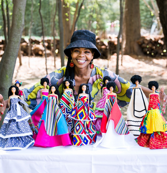 Mmule Ramothibe Ka Pityana with her Nandikwa Simply Beautiful dolls.