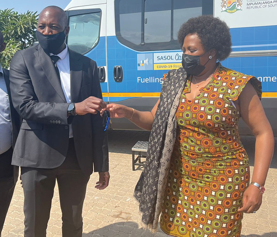 Sasol Operations and Assets Senior Vice President Simon Baloyi with Mpumalanga Premier Refilwe Mtshweni- Tsipane at Nhlazatshe during an event which saw Sasol donating medical equipment.