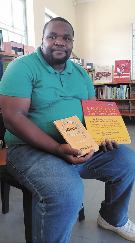 Mnqobi Mkhize is a reading champion at a school in his community, where he is employed as an educator assistant.
