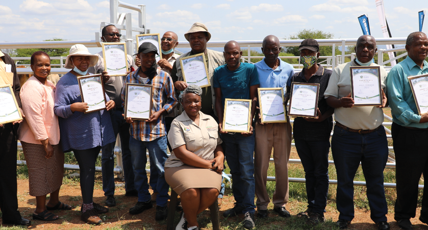 Beneficiaries from the 11 villages who received livestockhandling facilities from the North West Department of Agriculture and Rural Development, pictured with MEC Desbo Mohono.