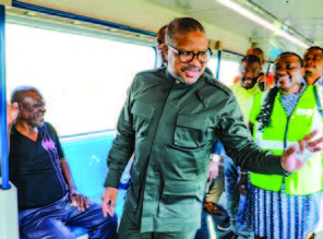 Transport Minister Fikile Mbalula speaks to commuters at the launch of Transport Month.