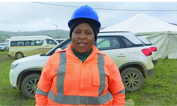 Fikiswa Zokufa can now provide for her family after being employed due to the construction of the Msikaba bridge (on the left).