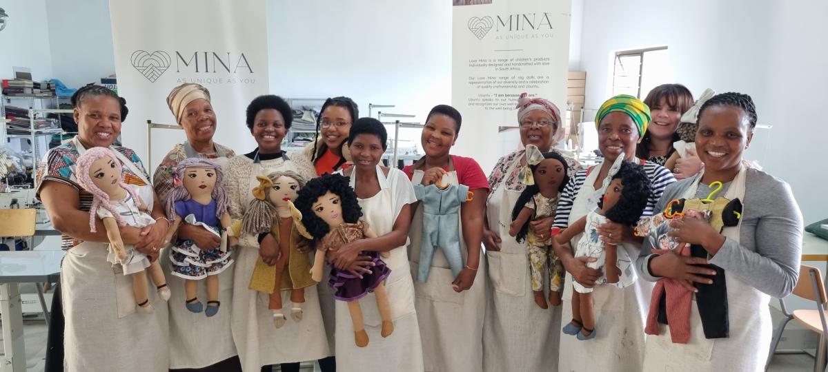 The workers of Love Mina which is a company that exhibited their business during the 2023 Buy Local Summit and Expo. The purpose of the summit was to educate consumers on the importance of buying locally produced good. 