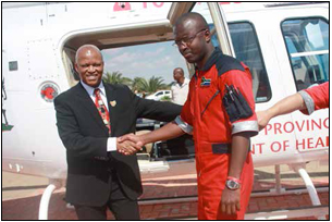 MEC Magome Masike with an ER24 paramedic at the launch of the helicopter.