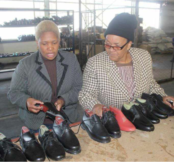 Nthako Moleboheng and Nomvula Finger with three other female members call themselves Halala Basadi Cooperative. They manufacture school shoes, morning slippers and sandals.