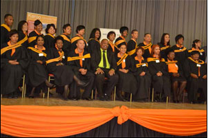 Graduates of the Tourism Ambassador Programme, an initiative of the Western Cape Department of Tourism, celebrate their achievement with George Mayor Edward Njadu.