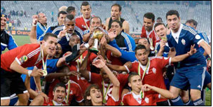 Libya celebrates after edging out Ghana on penalties to lift the CHAN trophy.