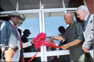 Justice Minister Jeff Radebe, supported Public Works Deputy Minister Jeremy Cronin, officially opens the revamped Kagiso Magistrate’s Court.